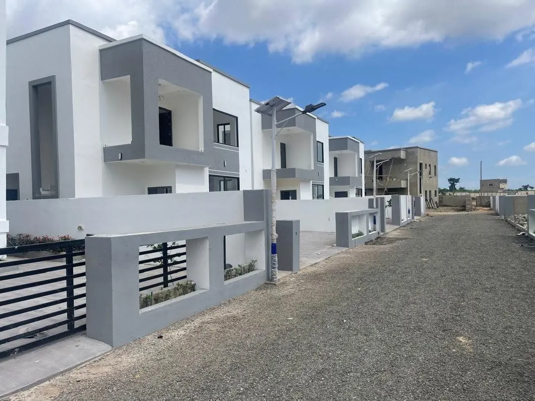 Contemporary two-story homes with balconies built by Jolly Homes